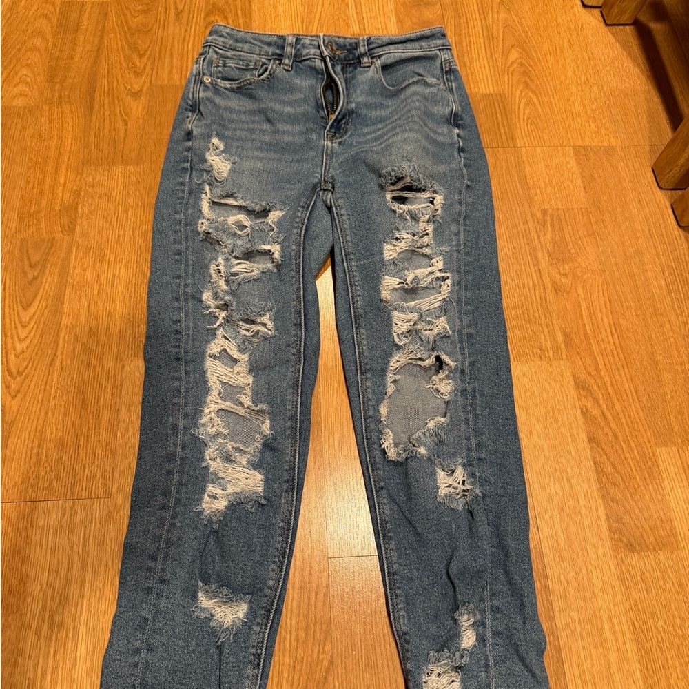 Distressed Blue Denim Jeans